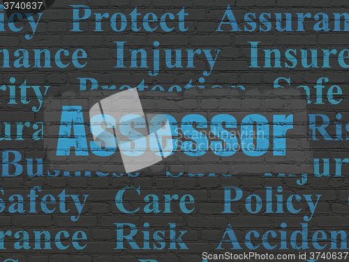 Image of Insurance concept: Assessor on wall background