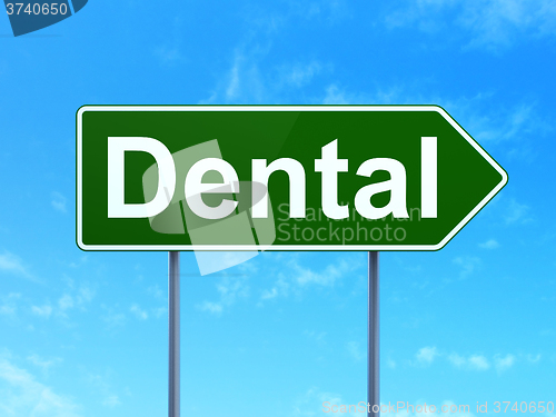 Image of Healthcare concept: Dental on road sign background