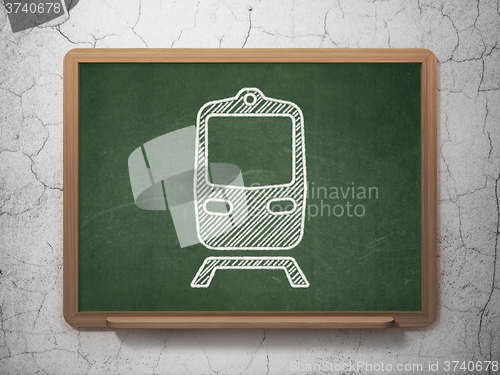 Image of Tourism concept: Train on chalkboard background