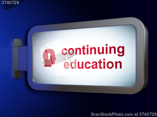 Image of Education concept: Continuing Education and Head With Keyhole on billboard background