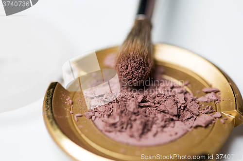 Image of close up of makeup brush and eyeshadow