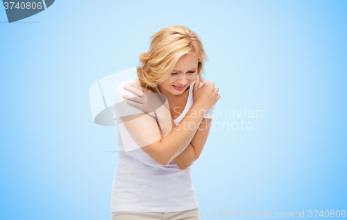 Image of unhappy woman suffering from pain or violence