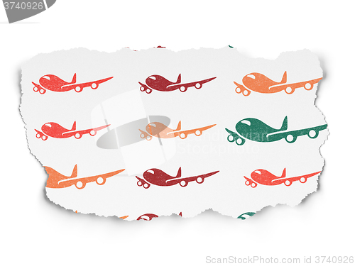 Image of Travel concept: Airplane icons on Torn Paper background