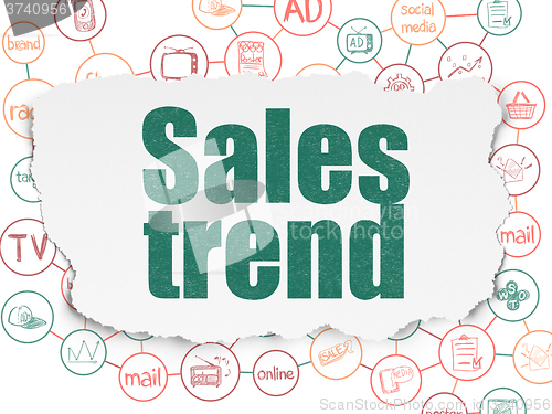 Image of Advertising concept: Sales Trend on Torn Paper background