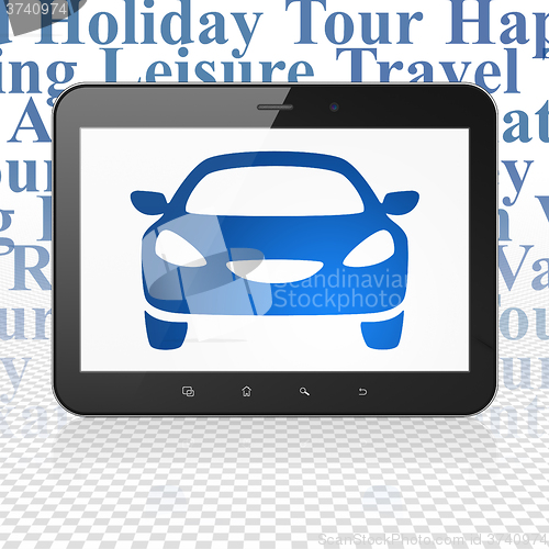 Image of Vacation concept: Tablet Computer with Car on display