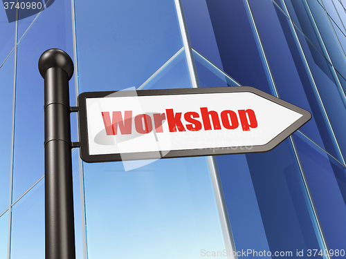 Image of Studying concept: sign Workshop on Building background