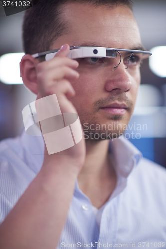 Image of man using virtual reality gadget computer glasses