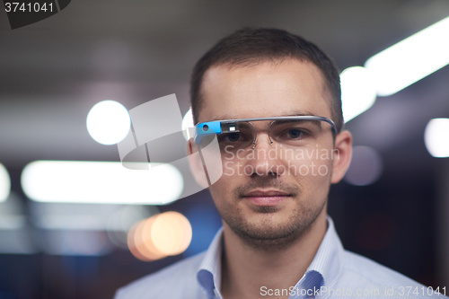 Image of man using virtual reality gadget computer glasses