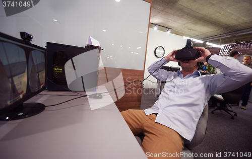 Image of man using virtual reality gadget computer glasses