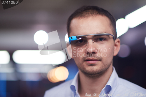 Image of man using virtual reality gadget computer glasses