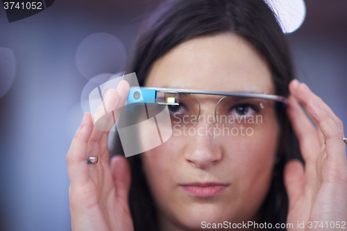 Image of woman using virtual reality gadget computer glasses