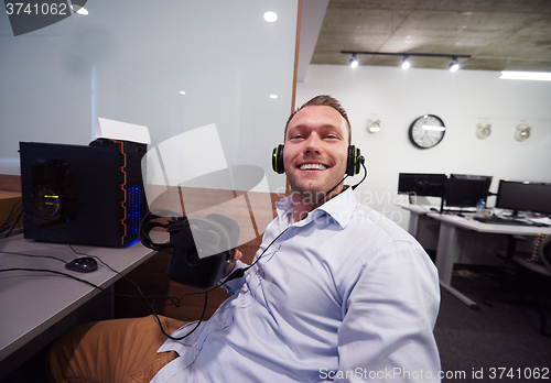 Image of man using virtual reality gadget computer glasses