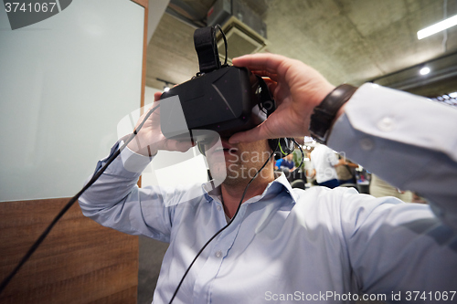 Image of man using virtual reality gadget computer glasses