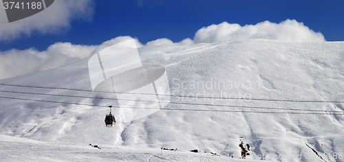 Image of Panoramic view on gondola lift and off-piste slope