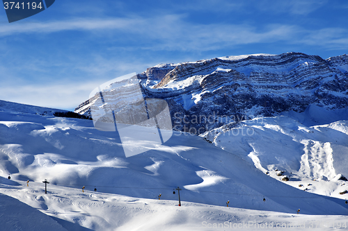 Image of Ski resort and sunlight rocks at sunset