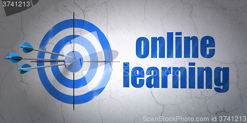 Image of Studying concept: target and Online Learning on wall background