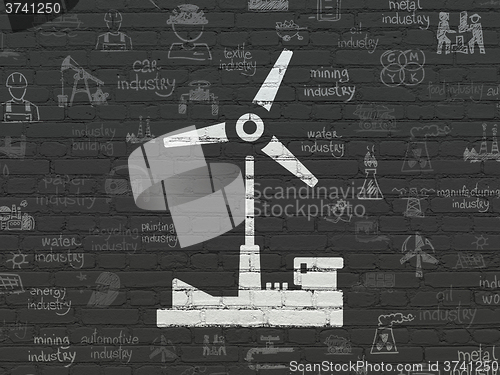 Image of Manufacuring concept: Windmill on wall background