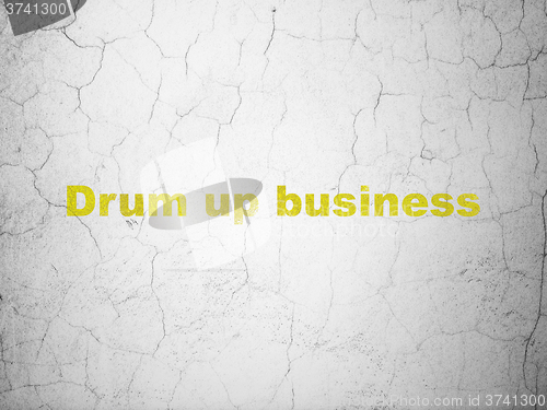 Image of Business concept: Drum up business on wall background