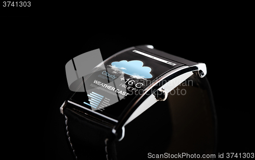 Image of close up of black smart watch with weather cast