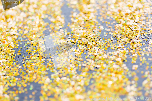 Image of golden glitter or yellow sequins background