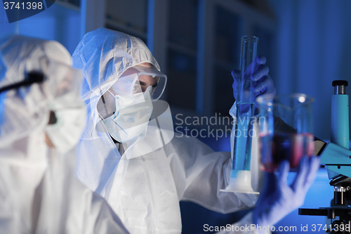 Image of close up of scientists making test in lab