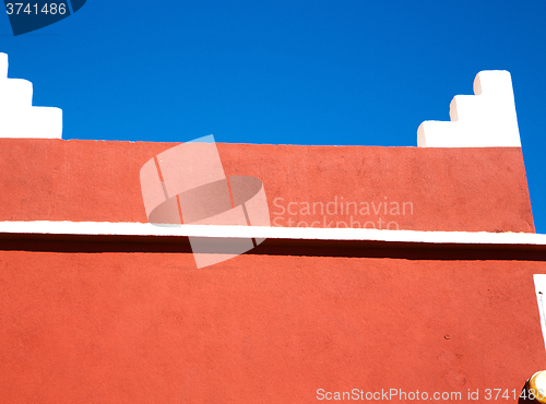 Image of moroccan old wall and brick red