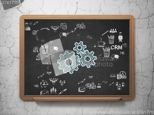Image of Finance concept: Gears on School Board background