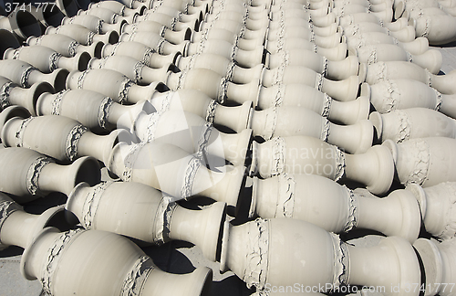 Image of Pottery bowls drying in the sun