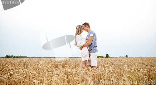 Image of happy smiling young hippie couple outdoors