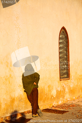Image of tile roof   old wall and brick in antique city
