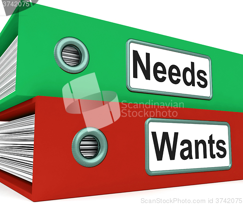 Image of Needs Wants Folders Show Requirement And Desire