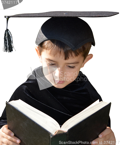 Image of Cute kid graduate with graduation cap