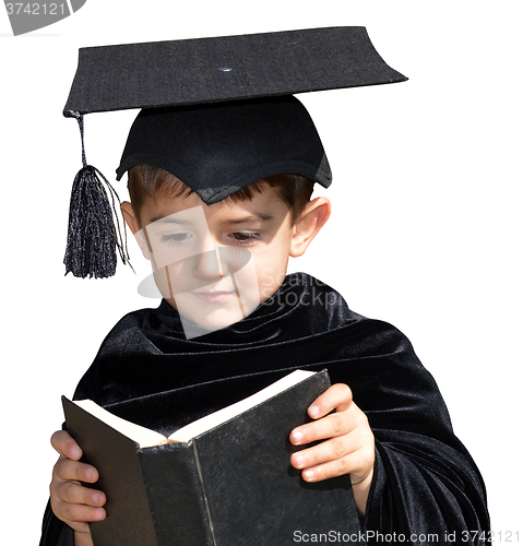 Image of Cute kid graduate with graduation cap