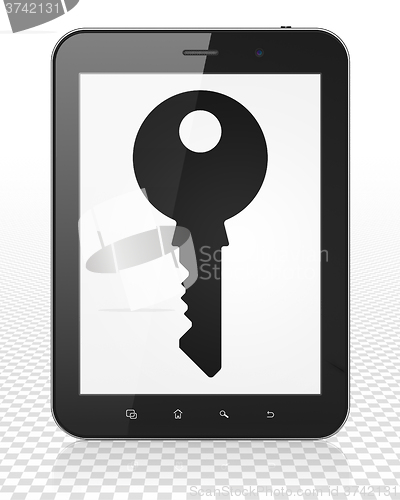 Image of Security concept: Tablet Pc Computer with Key on display
