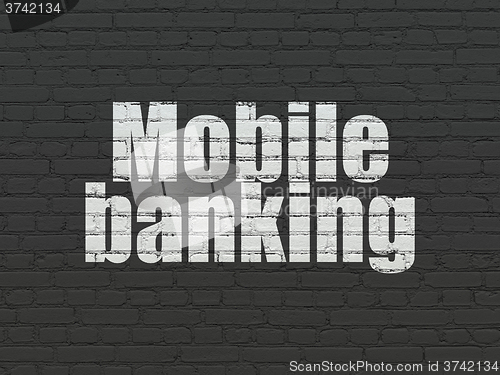 Image of Money concept: Mobile Banking on wall background