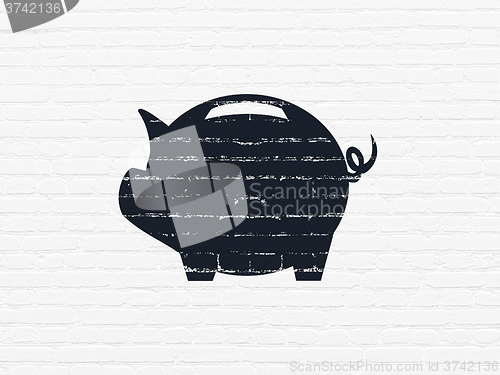 Image of Currency concept: Money Box on wall background