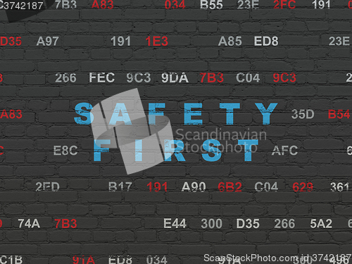 Image of Privacy concept: Safety First on wall background
