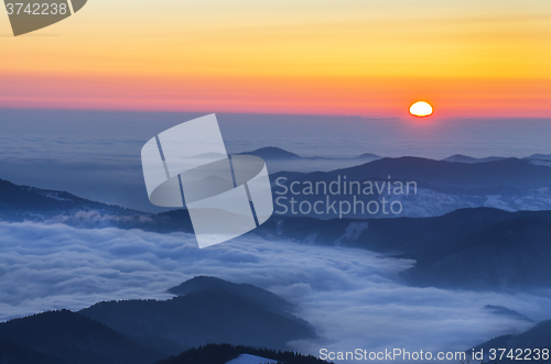 Image of Foggy winter sunrise