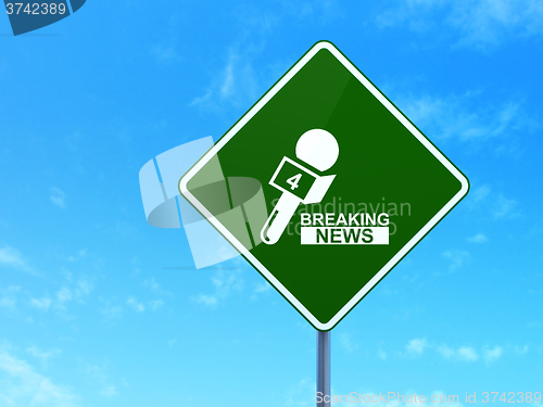 Image of News concept: Breaking News And Microphone on road sign background