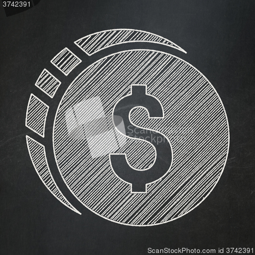 Image of Money concept: Dollar Coin on chalkboard background