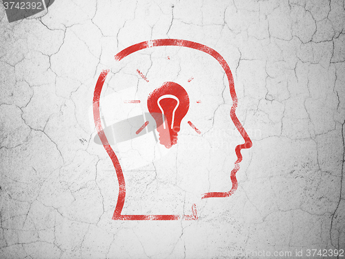 Image of Finance concept: Head With Lightbulb on wall background