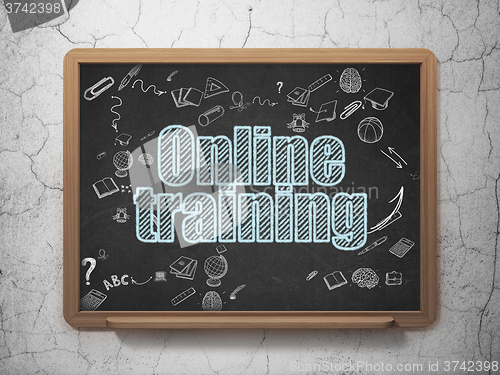 Image of Learning concept: Online Training on School Board background