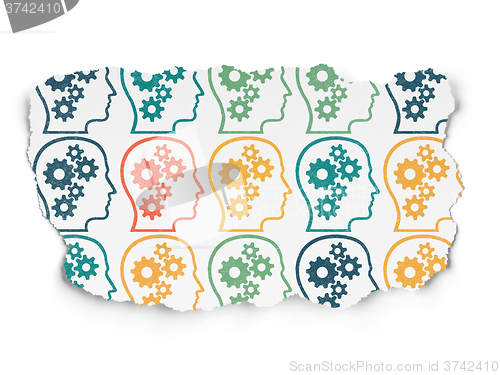 Image of Education concept: Head With Gears icons on Torn Paper background