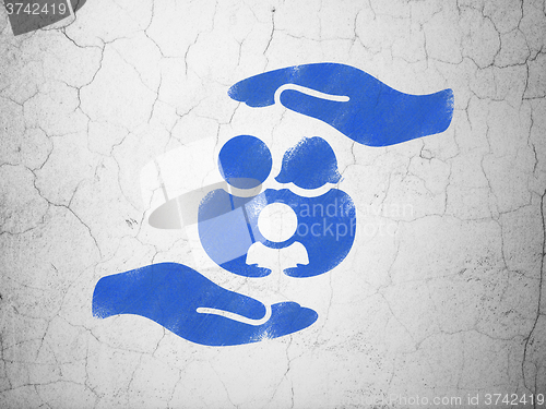 Image of Insurance concept: Family And Palm on wall background