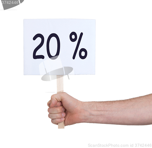 Image of Sale - Hand holding sigh that says 20%