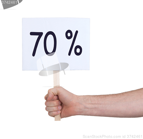 Image of Sale - Hand holding sigh that says 70%