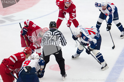 Image of A. Nikulin (36) and S. Kostitsyn (74) on face-off