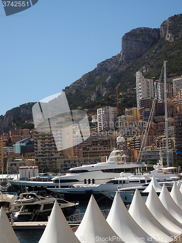 Image of harbor view  yachts and condos Monte Carlo Monaco Europe    