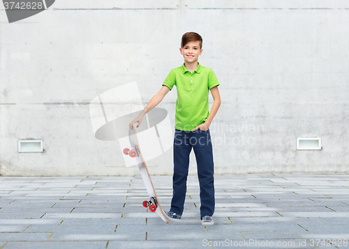 Image of happy boy with skateboard