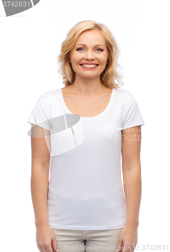 Image of smiling woman in blank white t-shirt
